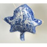 An early 19th century earthenware leaf shaped, 'Willow' pattern pickle dish, length 13.5cm.