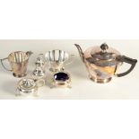 A Mappin & Webb three piece tea service and an EPNS three piece cruet.