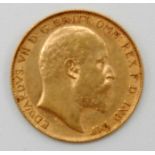 A George V half sovereign dated 1909, good, very fine.