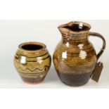 A Sidney Tustin, Winchcombe Pottery jug, 20.5cm and a studio pottery vase, impressed mark C.T.