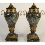 A pair of French green veined marble and chased ormolu mounted twin handle cassolettes on square