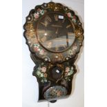 A Victorian black papier mache wall clock painted with flowers and inlaid with mother of pearl,