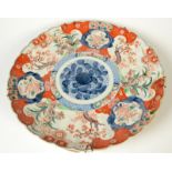 A large Japanese Imari porcelain charger, 19th century,