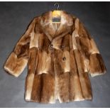 A gentleman's natural Muskrat coat, 'Burkholder Furs Ottawa, Canada' label,