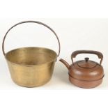 A Victorian brass preserve pan, with iron handle, diameter 29.5cm and a copper kettle.