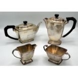 A silver Art Deco four piece tea and coffee service of rectangular section with stepped rims and