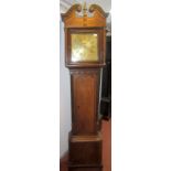 A George III inlaid oak longcase clock with a broken scroll pediment,