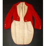 A Dartmoor Hunt scarlet tailcoat, with silk facings and thirteen 'Pitt & Co' brass buttons,