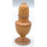 Treen, a George III turned fruitwood vase shaped pepper pot, height 13.