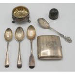 A silver mid 18th century open salt on three legs, four various silver spoons,