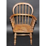 A child's Windsor stickback chair.