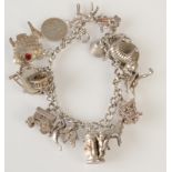 A silver charm bracelet, 56.5g.