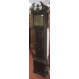 An oak longcase 30 hour clock with a broken swan neck pediment,