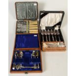 Four sets of boxed and cased flatware.