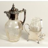 A cut glass claret jug and a pickle stand with cut glass jar.