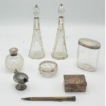 A silver topped toilet bottle etc, including silver plate.