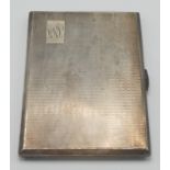 A silver engine turned cigarette case, Birmingham 1945, 6.9oz.