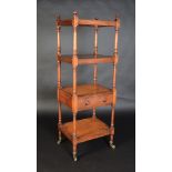 A George IV mahogany whatnot of four tiers, one is fitted with a single drawer,