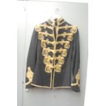 A 19th century Hussars military uniform jacket, the blue cloth with metallic braiding, labelled 'H.