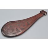 A carved Maori club or mere, length 36cm.