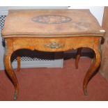 A good English fold top card table in French Louis XV taste, the whole walnut veneered,