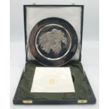 A Churchill Mint 1977 commemorative silver bird plate by James Woodford, hallmark Sheffield 1976,