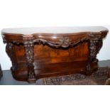A remarkable Victorian, richly carved serving table in oak and burr oak,