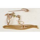 An Edwardian gold pendant set peridot and half pearls, broken,