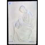 A moulded plaster plaque showing a mother breastfeeding a child, 47 x 31cm.