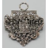 A Victorian cast silver paper clip by William Comyns, London 1890.