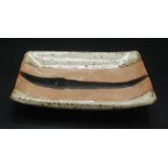 Janet Leach, St Ives Pottery, a small rectangular dish with a trail of tenmoku glaze,