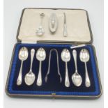 A set of six silver teaspoons with tongs, cased, together with three other pieces.