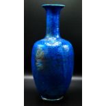 A tall bottle vase by John Bedding with brilliant blue raku glaze, impressed mark, height 37.3cm.