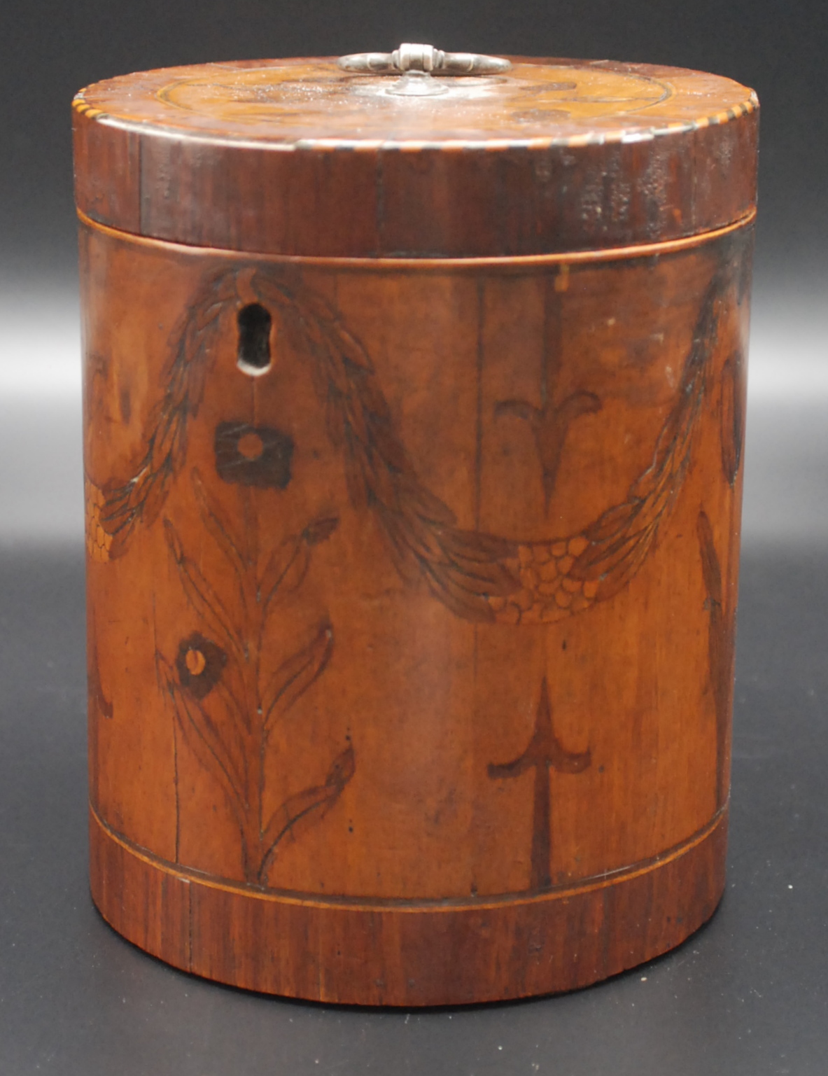 An extremely rare George III cylindrical tea caddy, the hinged lid with silver (unmarked) handle,