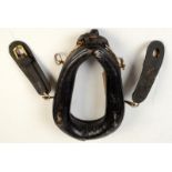 A very small leather and nickel plated harness collar, maybe for a dog, height 26cm.