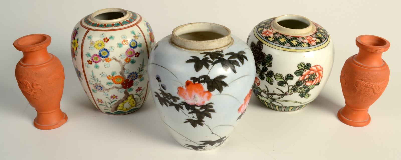 Two Chinese porcelain famille verte ginger jars, heights 15cm and 13cm,