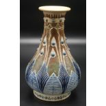 A Martin Brothers stoneware pear form vase by Robert Wallace Martin, incised to the base H2 R.W.