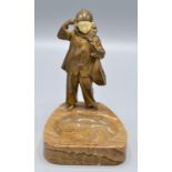 An Austrian bronze and ivory model of a young Pierrot holding a mandolin,