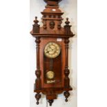 A late 19th century continental walnut wall clock.