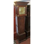 A triple train oak longcase clock chiming on six bells and with brass unsigned 12" dial and