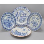 A Chinese 18th century, blue and white plate decorated with a garden scene with terrace,