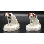 Two rare 19th century Staffordshire porcelain gilt chained dismal hounds,