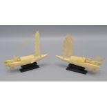 A pair of Chinese, early 20th century ivory sailing junks,