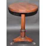 A rosewood veneered William IV occasional table with circular top and tripod plinth base.