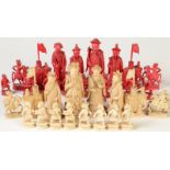 A Chinese Canton ivory chess set, depicting an early period of Emperors and Empresses as Ming,