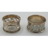 Two cased silver napkin rings.