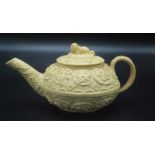 A Wedgwood early 19th century creamware bachelor's teapot moulded with flowers,