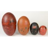 A Japanese nest of four eggs, lacquered,