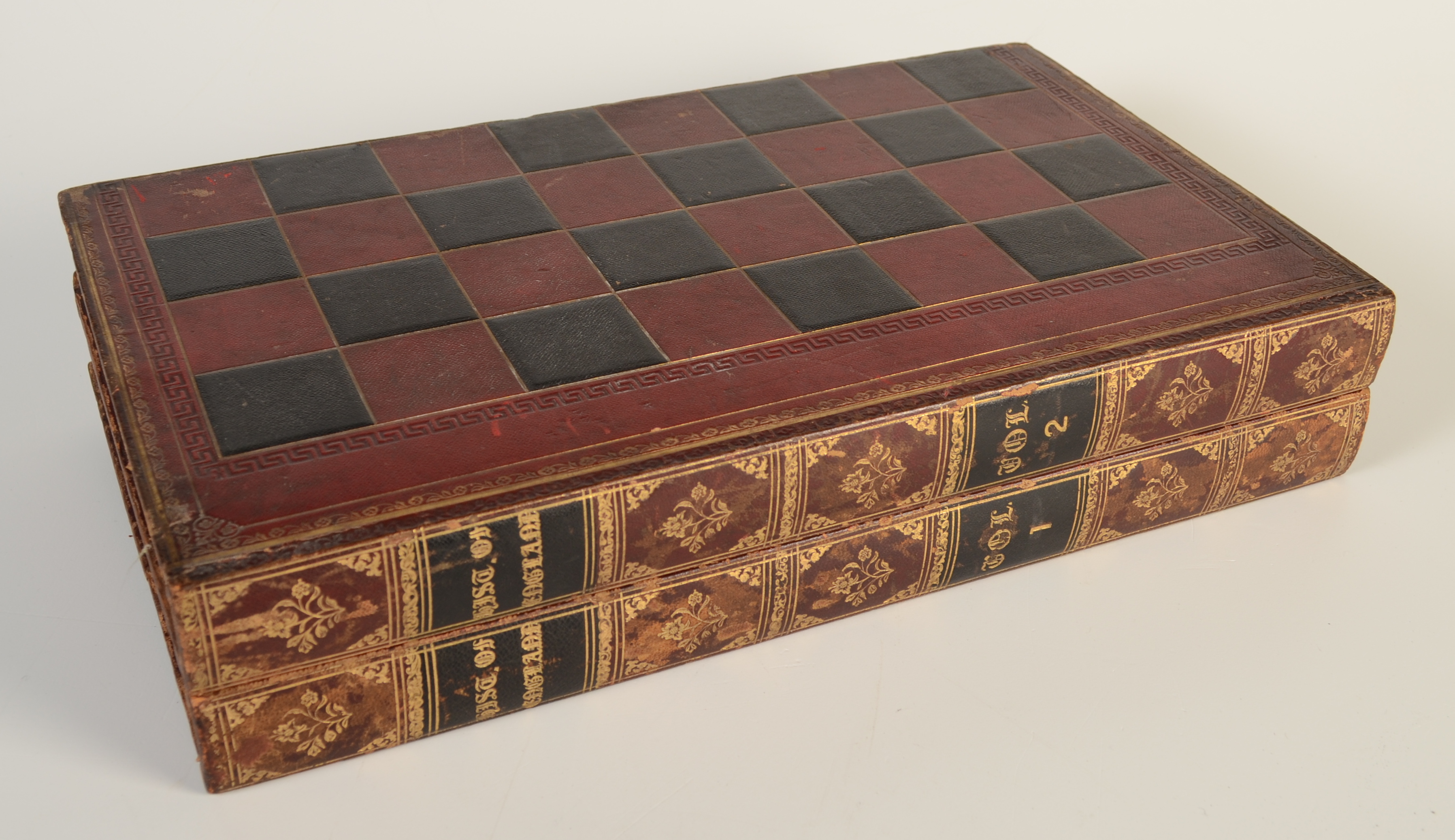 A set of red and natural bone draughts, in a good tooled gilt leather bound book case/board. - Image 2 of 2