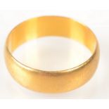 A 22ct. yellow gold band, 5.1g. Condition report: Diameter of band - Internal 5.75cm.